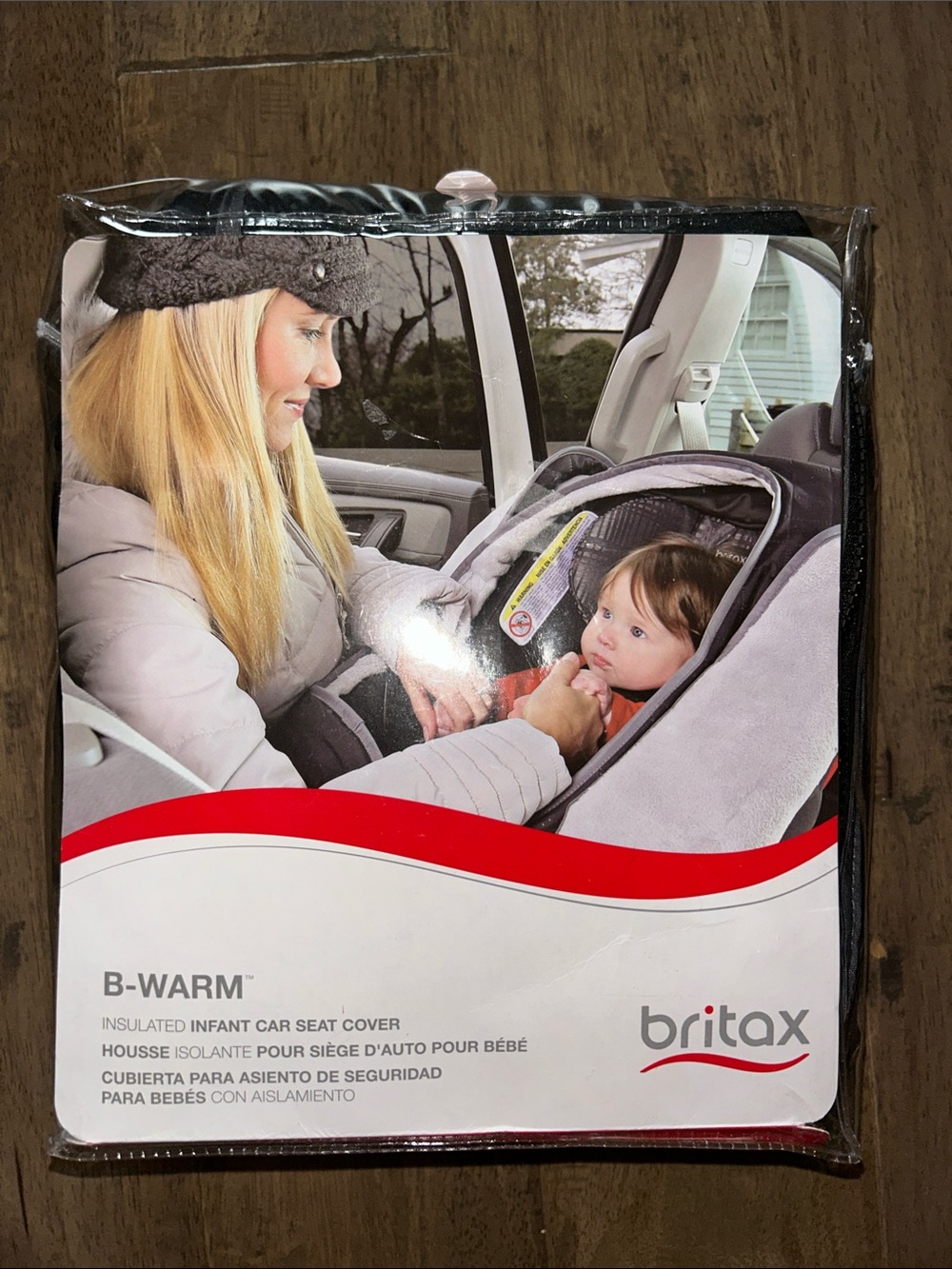 Never opened Britax Infant Car Seat Cover in Gray and Black